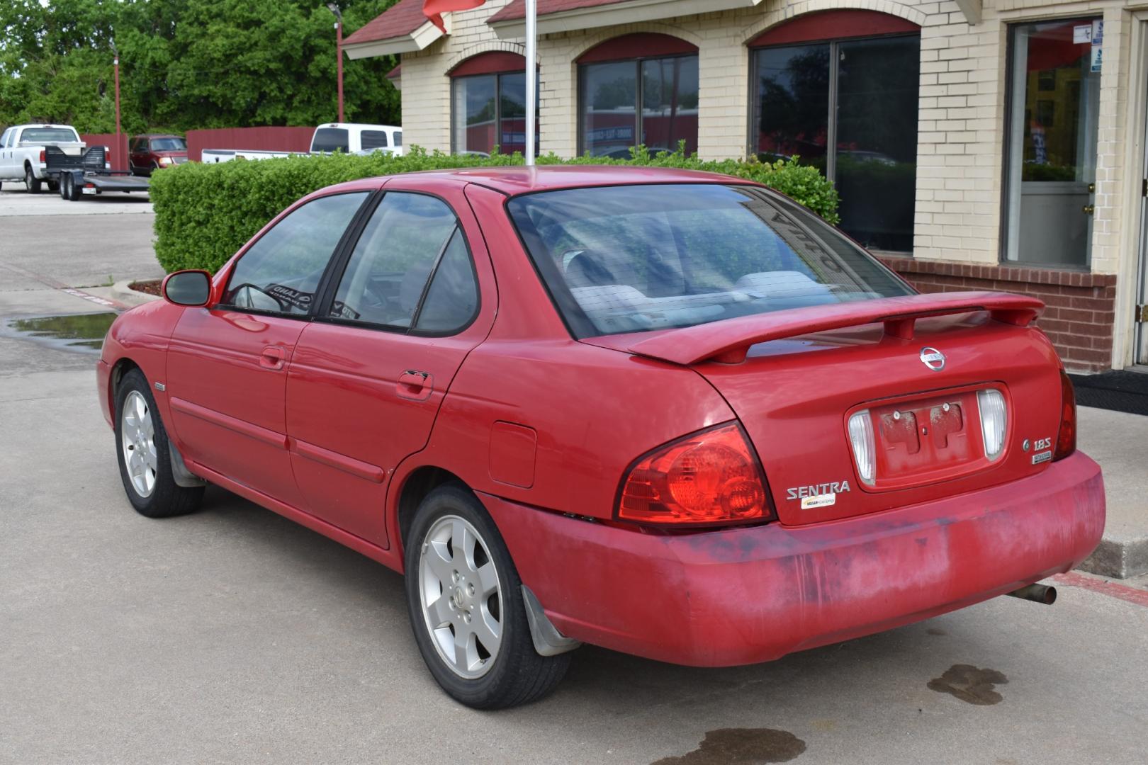 2005 Red Nissan Sentra 1.8 (3N1CB51D25L) with an 1.8L L4 DOHC 16V engine, 4 SPEED AUTOMATIC transmission, located at 5925 E. BELKNAP ST., HALTOM CITY, TX, 76117, (817) 834-4222, 32.803799, -97.259003 - Photo#2